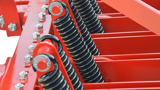 Cultivator With Eztension Spring